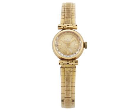 Golana. A lady's 18ct gold manual wind bracelet watch with 14ct gold bracelet, Circa 196517 jewel manual wind movement, silve
