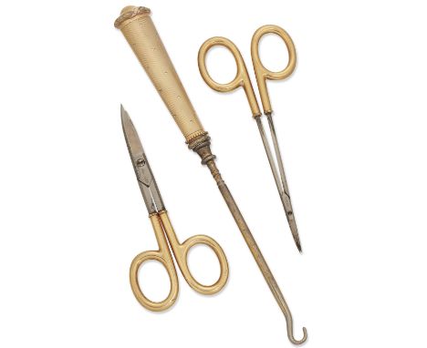 Cartier. A button hook and two pairs of vanity scissors, each scratch engraved 14k, Cartier, NY to handle, the button hook de