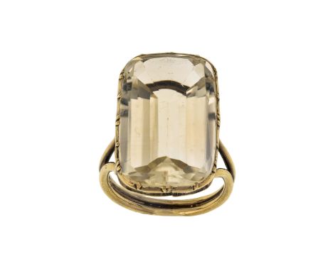 A citrine ring, the step-cut rectangular citrine in 19th century cut-down claw setting to later gallery and bifurcated hoop, 
