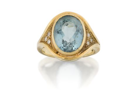 A diamond and topaz ring, the oval collet-set topaz to triple diamond point shoulders, hoop stamped 750, approximate ring siz