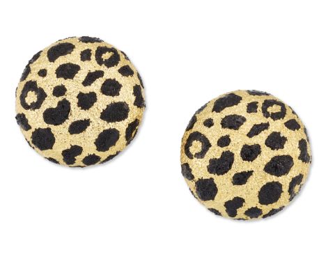 Gay Frères. A pair of 18ct gold clip earrings, of circular textured form, with black enamel leopard spot decoration, maker's 
