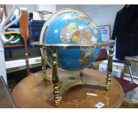 A large gemstone style table top globe.