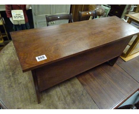 A mahogany plank box stool