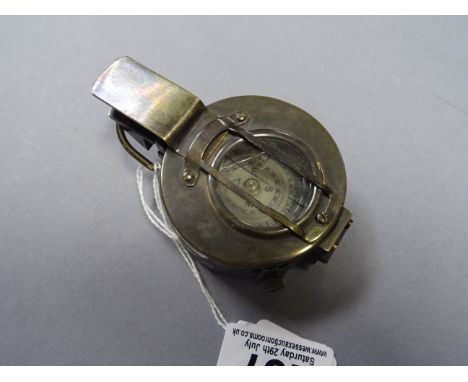 Military style marching compass marked T.G.Co Ltd London MKIII 1941
