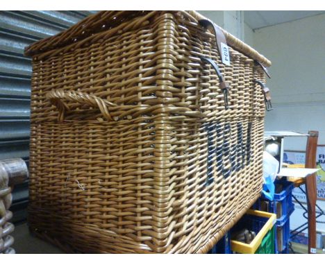 A large Fortnum and Masons hamper basket.