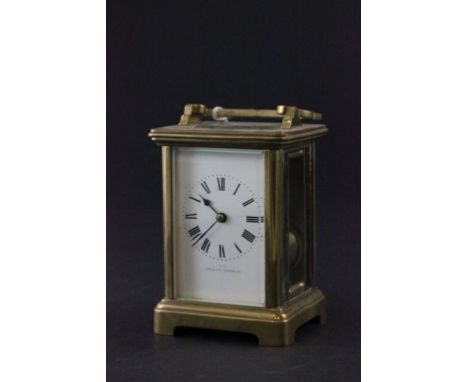 A brass carriage clock retailed by Jays, 442-444 Oxford St