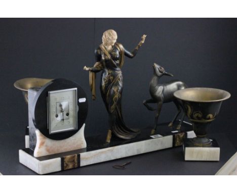 Art Deco French Mantle Clock Garniture surmounted with a Spelter Deco Lady and a Deer on a Black Marble and White Onyx Base i