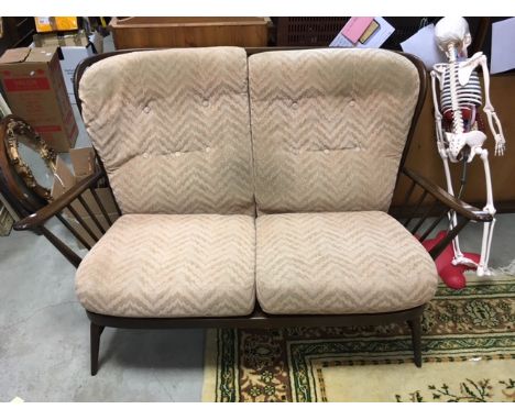An Ercol two seater sofa
