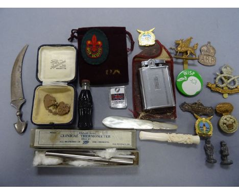 Mixed lot comprising Military Cap Badges, Carved Bone Cheroot, Lighter, Mizpah Brooch, Lead Figures, Miniature White Metal Pe