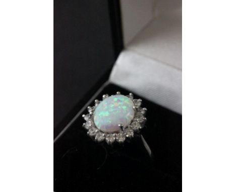 Substantial silver, cz and opal ring