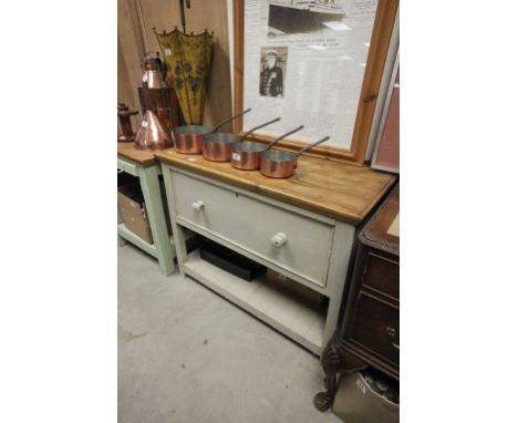 Kitchen work table with deep drawer & pot shelf below