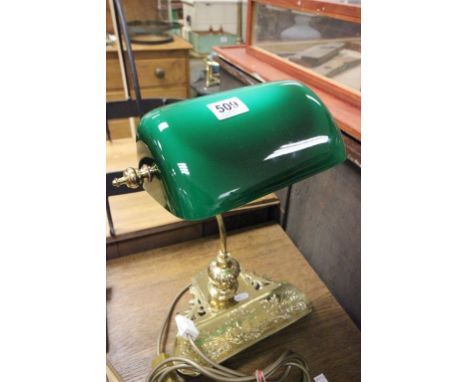 Brass adjustable desk lamp with pen tray and green shade