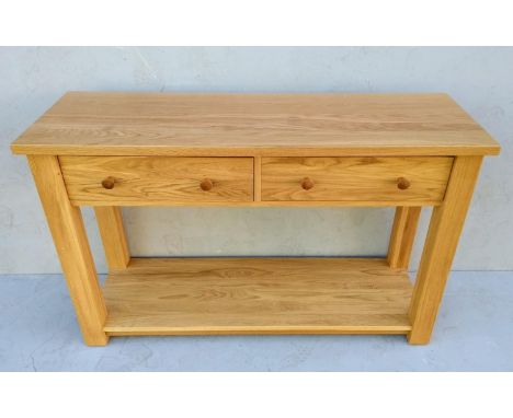 A contemporary light solid oak consul table with frieze drawers, 7 7H x 122 W x 40 cm D (legs 7x7 cm) 