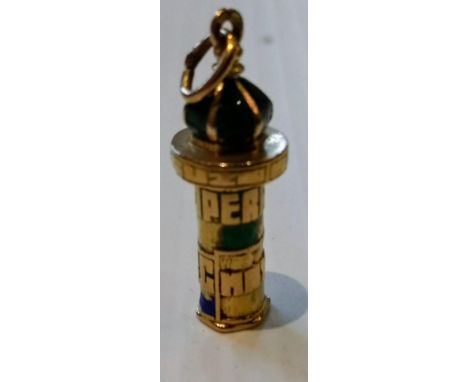 A vintage gold charm with multicoloured enamel in the form of a Parisian kiosk displaying: Lido, Mayol, L'ABC, and Opera, ena