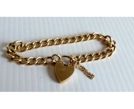 A 9ct yellow gold curb and padlock chain bracelet, 18cm, 27.28g
