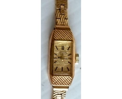 A ladies Rotary 9ct yellow gold wrist watch with oblong dial, baton markers, needs battery, 17 cm, 14.50g 