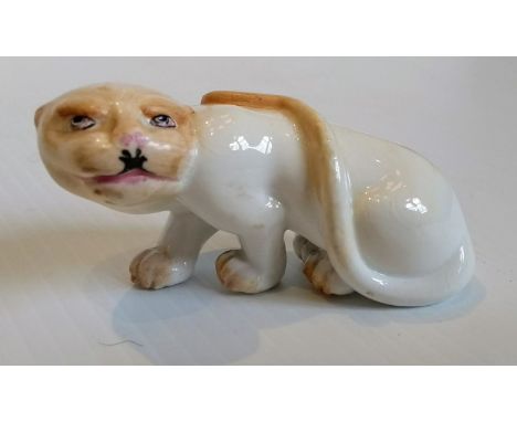 A Royal Worcester blush ivory netsuke, modelled as a cheetah, 1913, 4.5cm H, printed mark, without damage or repair 