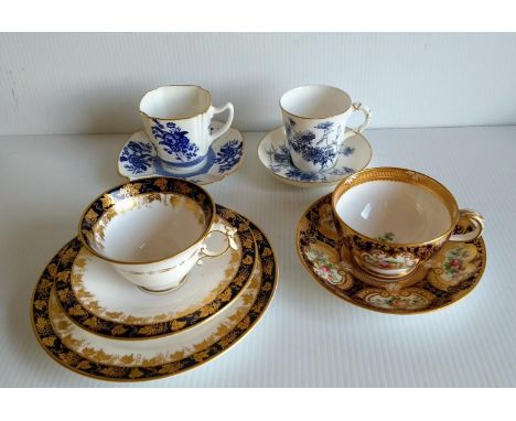 A Victorian Minton cabinet cup and saucer, pattern 8014; an Edwardian Royal Worcester cabinet cup saucer and plate, pattern 4