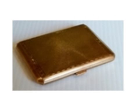 An early 20th century 9ct yellow gold cigarette case with engine turned design and canted corners, maker's mark rubbed, initi