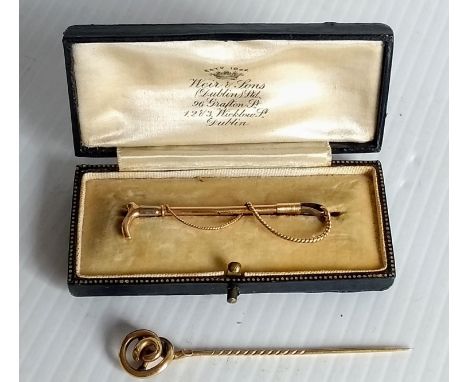 A walking stick-shape yellow-gold bar brooch, hallmarked 15ct in original case retailed by Weir & Sons, Dublin, maker's mark 