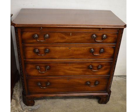 Reproduction Georgian mahogany chest of drawers with blind fretwork canted corners, swan neck handles &amp; bracket feet W 95