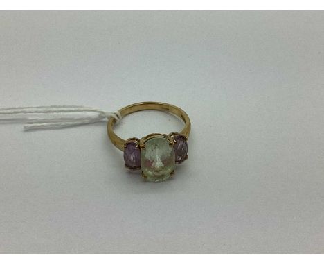 A 9ct Gold Three Stone Dress Ring, of faceted oval shape and graduated size, four claw set throughout to tapered band (finger