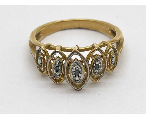A Five Stone Illusion Set Dress Ring, alternately diamond set within high marquise shape setting, between bifurcated band (fi