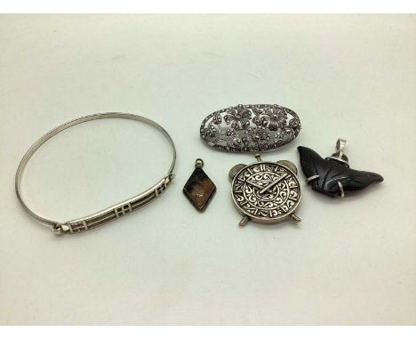 A Blue John Inlaid Pendant, of kite shape stamped "SILVER", a Celtic style bangle of hinged design stamped "925", a marcasite