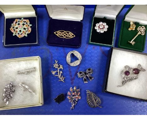 An Assortment of Costume Brooches, to include gilt coloured Celtic knot brooch, imitation pearl bead set brooch of foliate st