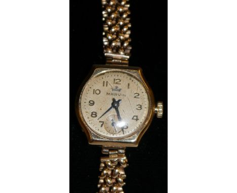 Maevin - a 9ct gold lady's wristwatch, champagne dial, Arabic numerals, minute track, subsidiary seconds, manual movement, 9c