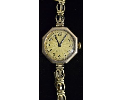 Rolex - a vintage lady's 9ct gold cased wrist watch, engine turned dial, black Arabic numerals, minute track, octagonal outer
