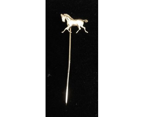 A yellow metal Cantering Horse tie/scarf pin, the top as a Cantering Horse, unmarked gold coloured metal, 51mm long, 1.4g gro