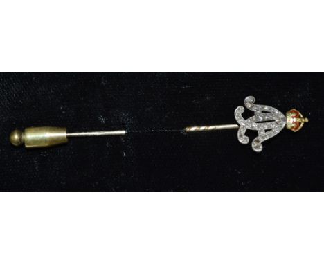 An enamel & diamond scarf pin, Over lapping AA crest encrusted with thirty six rose cut diamonds beneath a red and green enam