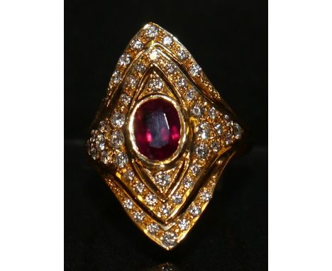 A ruby and diamond navette cluster ring, central oval red ruby, approx 1.55ct, collar set above a triple level diamond encrus