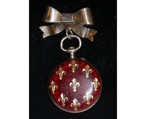 A continental silver plated and enamel lady's fob watch, gilt Fleur de Lys and red enamelled back cover, cream dial, Roman nu