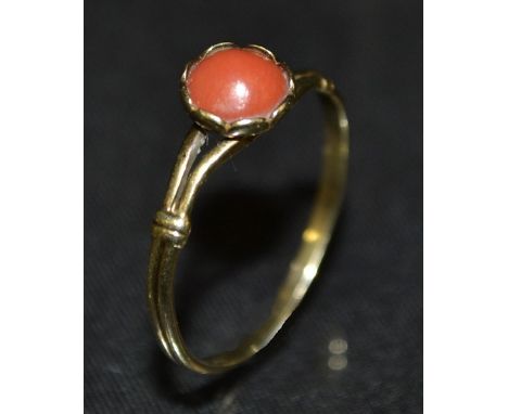 A coral dress ring, single circular cabochon coral bead, 8ct gold shank, stamped 333, size R, 1.2g gross