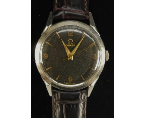 Omega - A vintage 1950s wrist watch, textured black dial, Quartered Arabic numerals, arrow markers, minute track, centre seco