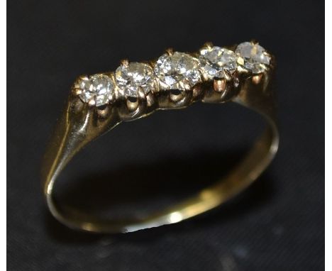 A five stone diamond ring,  linear set with five graduated round brilliant cut diamonds, total diamond weight approx 0.33ct, 