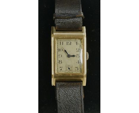 An Art Deco 9ct gold gentleman's tank watch, rectangular silvered dial, Arabic numerals, subsidiary seconds, 15 jewel manual 