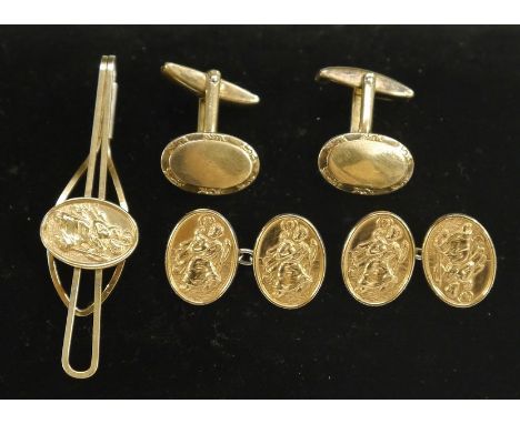 Gentlemen's Accessories - a pair of 9ct gold on silver oval St Christopher cufflinks and matching tie clip;  another pair pla