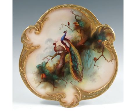 A Royal Worcester shaped and pierced trefoil plate, decorated with peacock and peahen in a fir tree by Jarman, diameter 9ins,