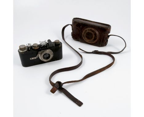 An Ernst Leitz Wetzlar D.R.P camera, the lens marked&nbsp;1:35F=50mm, No. 35966, in leather case