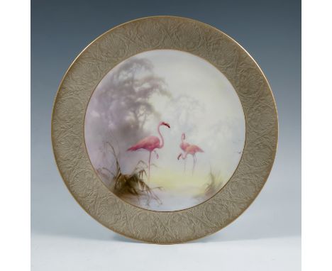 A Royal Worcester plate, decorated with three wading flamingos to a moulded grey classical border, circa 1912, diameter 9insC