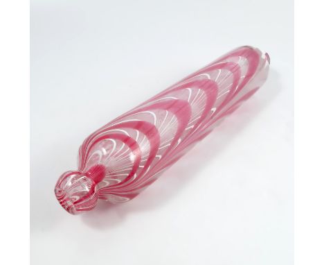 A 19th century Nailsea glass rolling pin, decorated with pink and white swirls, length 14ins