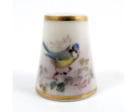 A Royal Worcester thimble, painted with a blue tit, by W Powell, circa 1935Condition Report:  Inspected and no issues found