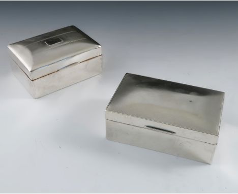 Two hallmarked silver cigarette boxes, of rectangular form, with engine turned covers