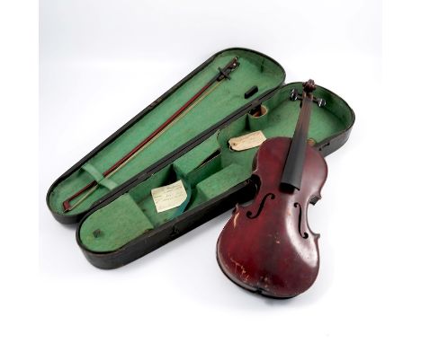 A cased violin, the case and violin bearing label for the Maidstone School Orchestra Asstn. London, together with bow, length