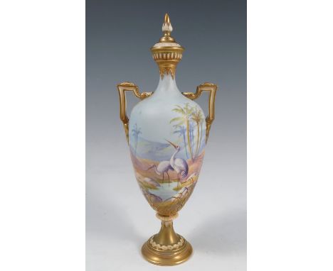 A Royal Worcester covered vase, decorated with storks in an all around desert landscape by Shuck, shape number 2147, circa 19