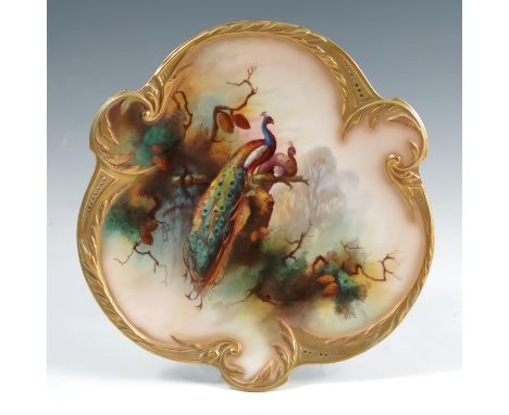 A Royal Worcester shaped and pierced trefoil plate, decorated with peacock and peahen in a fir tree by Jarman, diameter 9ins,