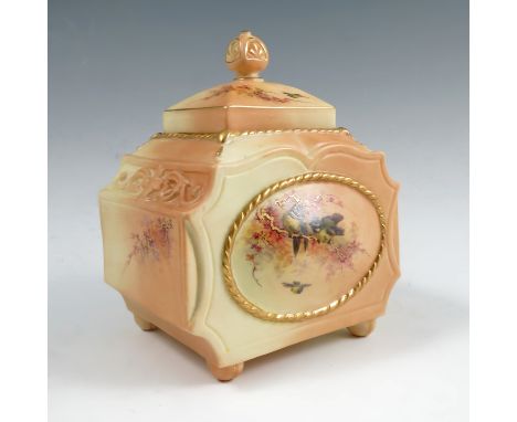 A Royal Worcester blushed ivory tea caddy, of rectangular form, decorated with panels of blue tits and flowers with gilt rope